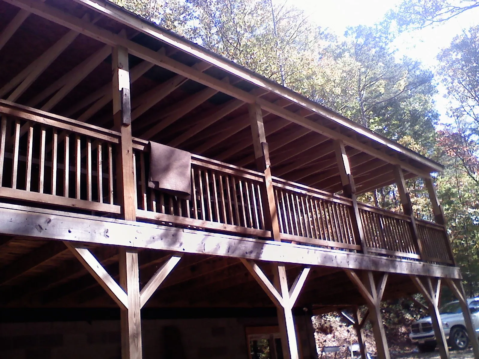 Timber framing under a new elevated porch and deck — Roof Leak Repair in Continental by Roofing Brothers